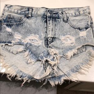 Worn one distressed light jean shorts